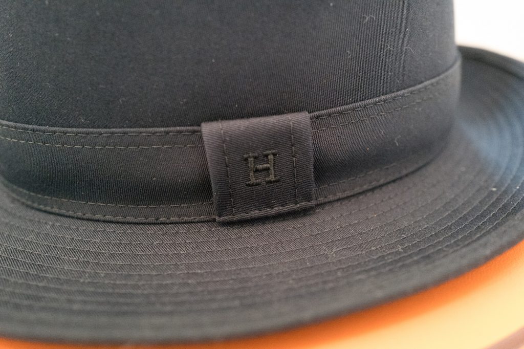 Hermes blue hat H logo