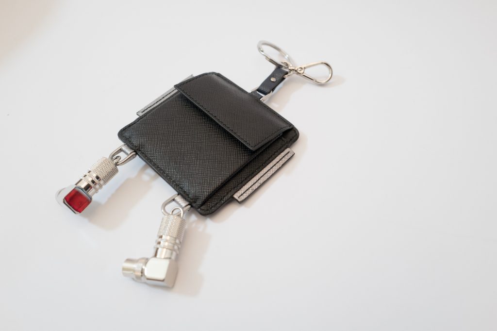 Prada leather robot ticket keyring